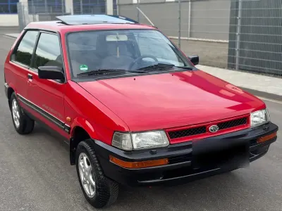 Gebraucht Subaru Justy 75 PS (55 kW) 1991 Rot Kleinwagen