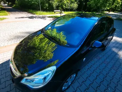 Używany Opel Corsa 86 KM (63 kW) 2012 Czarny Hatchback