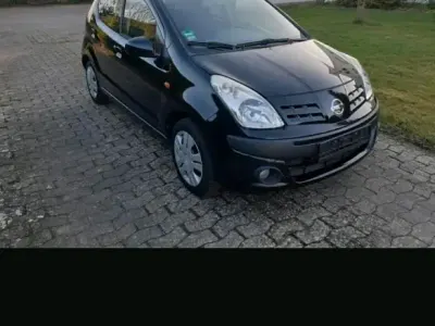 Gebraucht Nissan Pixo 68 PS (50 kW) 2011 Schwarz Kleinwagen