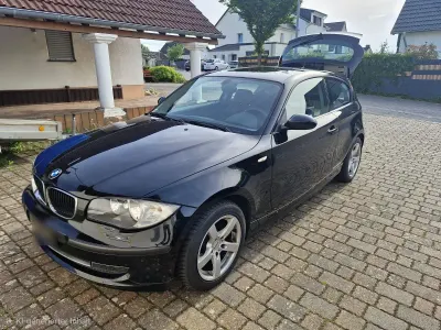 Gebraucht BMW 116 122 PS (89 kW) 2009 Schwarz Kleinwagen