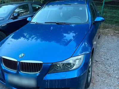 Gebraucht BMW 318 122 PS (89 kW) 2007 Blau Kombi