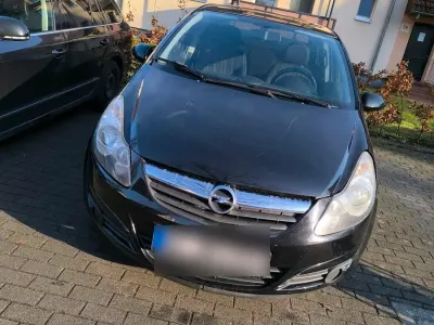 Używany Opel Corsa 80 KM (58 kW) 2010 Czarny Hatchback