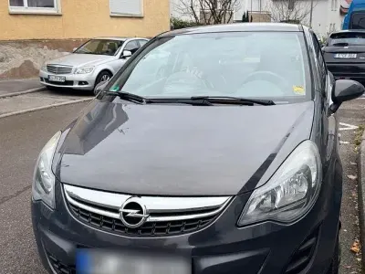 Usado Opel Corsa Edition 69 HP (50 kW) 2014 Cinzento Citadino
