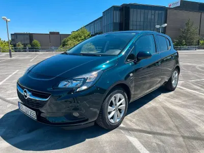 Gebraucht Opel Corsa drive 101 PS (74 kW) 2016 Grün Kleinwagen