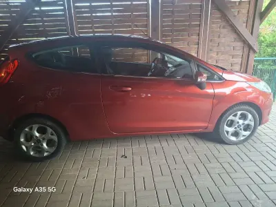 Gebraucht Ford Fiesta Ghia 97 PS (71 kW) 2009 Orange Limousine