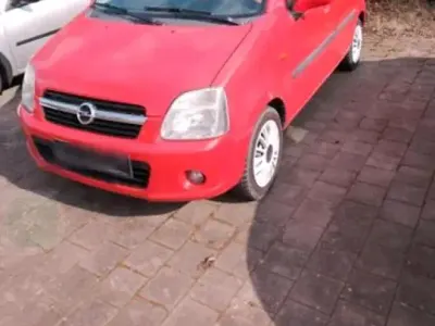 Używany Opel Agila 60 KM (44 kW) 2005 Czerwony Minivan