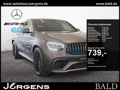Gebraucht Mercedes GLC63 AMG AMG 476 PS (350 kW) 2023 Metalliclack selenitgrau Coupé