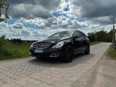 Używany Mercedes R500 306 KM (225 kW) 2006 Czarny Minivan