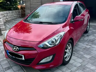 Gebraucht Hyundai Coupé Style 99 PS (72 kW) 2014 Rot Coupé