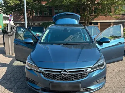 Gebraucht Opel Astra Business 135 PS (99 kW) 2017 Blau Kombi