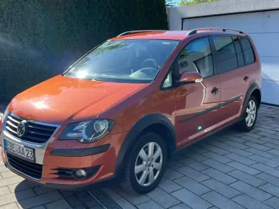 Używany VW Touran Cross 170 KM (125 kW) 2007 Pomarańczowy Minivan