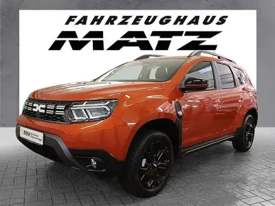 Używany Dacia Duster Extreme 101 KM (74 kW) 2023 Pomarańczowy SUV