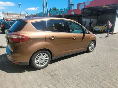 Gebraucht Ford C-MAX Titanium 140 PS (102 kW) 2013 Braun Van / Kleinbus