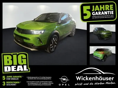 Gebraucht Opel Mokka Elegance 131 PS (96 kW) 2023 Matcha green/ikone gruen (metallic) SUV