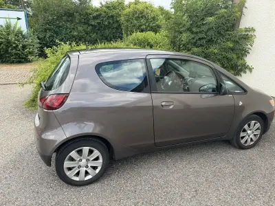 Gebraucht Mitsubishi Colt 75 PS (55 kW) 2011 Braun Kleinwagen