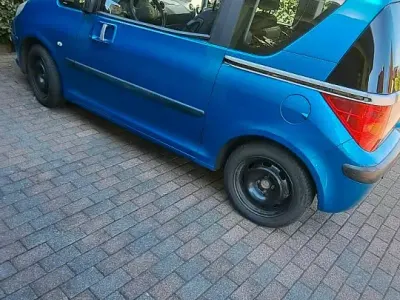 Gebraucht Peugeot 1007 72 PS (52 kW) 2006 Blau Van / Kleinbus