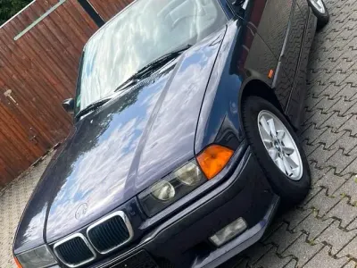 Gebraucht BMW 318 M Sport 118 PS (86 kW) 1997 Violet Cabrio