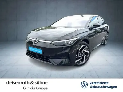 Gebraucht VW ID.7 Pro 210 kW (286 PS) 2023 Grenadillschwarz metallic Kleinwagen