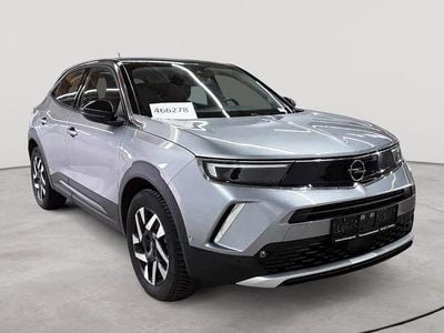 Gebraucht Opel Mokka-e Elegance 100 kW (136 PS) 2023 Quarz silber metallic SUV