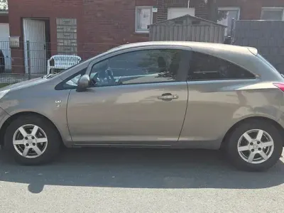 Używany Opel Corsa Edition 69 KM (50 kW) 2010 Brązowy Hatchback