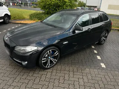 Gebraucht BMW 520 184 PS (135 kW) 2011 Schwarz Kombi