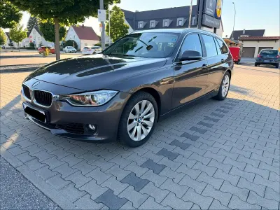 Gebraucht BMW 330 Sport Line 258 PS (189 kW) 2013 Braun Kombi