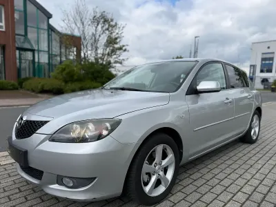 Używany Mazda 3 Exclusive 105 KM (77 kW) 2005 Szary Sedan/Limuzyna