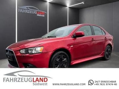 Second-hand Mitsubishi Lancer Sportback 150 CP (110 kW) 2014 Roșu Berlinǎ