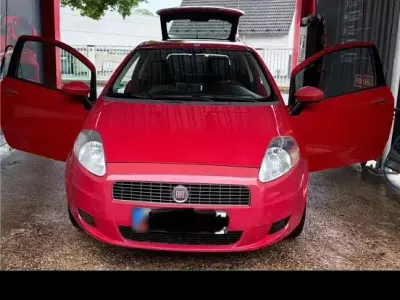 Gebraucht Fiat Grande Punto 77 PS (56 kW) 2009 Rot Kleinwagen