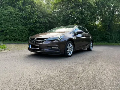 Używany Opel Astra Innovation 136 KM (100 kW) 2016 Brązowy Sedan/Limuzyna