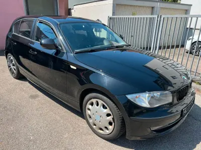 Gebraucht BMW 116 122 PS (89 kW) 2010 Schwarz Kleinwagen
