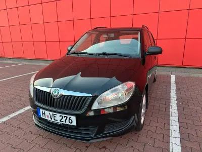 Używany Skoda Fabia 105 KM (77 kW) 2012 Czarny Kombi