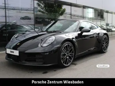Neu Porsche 911 Carrera 394 PS (289 kW) 2026 Tiefschwarzmetallic Coupé