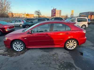 Gebraucht Mitsubishi Lancer 140 PS (102 kW) 2009 Rot Limousine