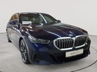 Gebraucht BMW i5 Comfort Edition 250 kW (340 PS) 2024 Tansanitblau metallic Kombi