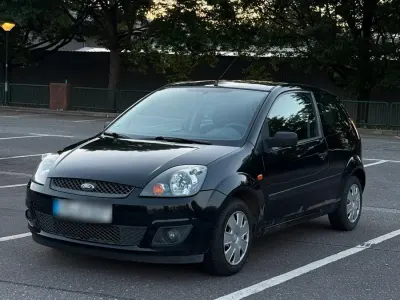Gebraucht Ford Fiesta 75 PS (55 kW) 2007 Schwarz Kleinwagen
