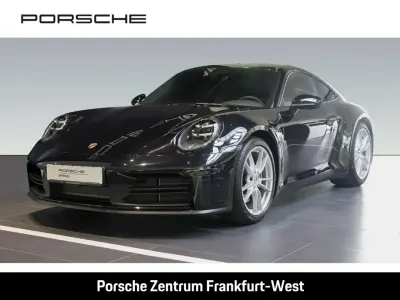 Gebraucht Porsche 911 Carrera 394 PS (289 kW) 2025 Tiefschwarzmetallic Coupé