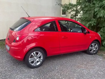 Gebraucht Opel Corsa 80 PS (58 kW) 2007 Rot Kleinwagen