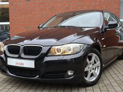 Second-hand BMW 318 Comfort Edition 143 CP (105 kW) 2008 Negru Break