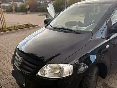 Gebraucht VW Fox 60 PS (44 kW) 2011 Schwarz Kleinwagen