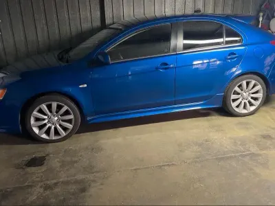 Gebraucht Mitsubishi Lancer 150 PS (110 kW) 2009 Blau Limousine