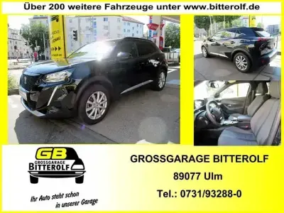 Gebraucht Peugeot e-2008 Allure 100 kW (136 PS) 2023 Perlaschwarzmetallic SUV