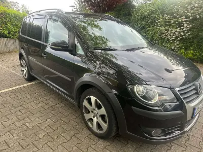 Używany VW Touran Cross Highline 170 KM (125 kW) 2010 Czarny Minivan