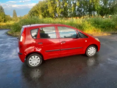 Gebraucht Mitsubishi Colt Motion 75 PS (55 kW) 2007 Rot Kleinwagen