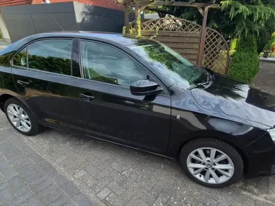 Gebraucht Skoda Rapid Ambition 105 PS (77 kW) 2013 Schwarz Kleinwagen