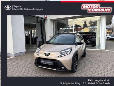Gebraucht Toyota Aygo X x-style 72 PS (52 kW) 2023 Ginger beige metallic/ night sky black SUV