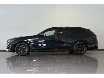 Gebraucht BMW 520 Sport Line 197 PS (144 kW) 2024 Schwarz carbonschwarz metallic (metallic) Kombi
