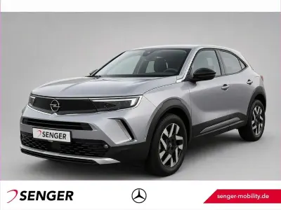Gebraucht Opel Mokka Elegance 131 PS (96 kW) 2022 Kontrast grau/quarz silber SUV