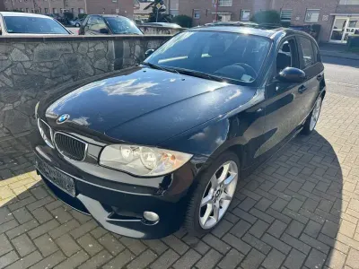 Second-hand BMW 116 122 CP (89 kW) 2006 Negru Hatchback
