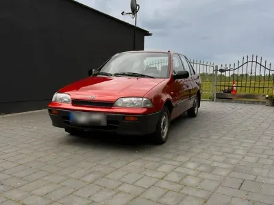 Gebraucht Suzuki Swift 64 PS (47 kW) 1993 Rot Limousine